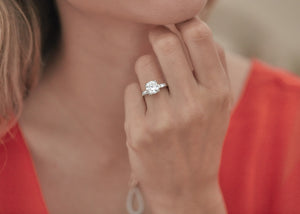 Model with sparkling diamond engagement ring