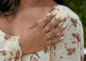 Model with three wedding rings