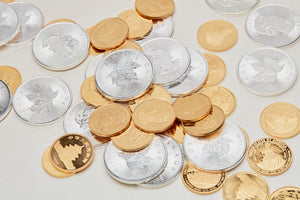 Assorted gold and silver coins image