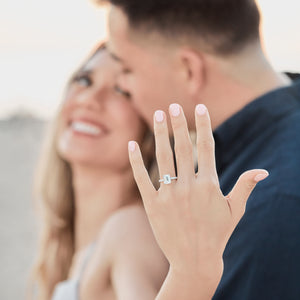 Engaged couple with ring closeup 