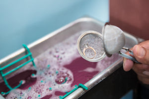 Jewelry being cleaned in an ultrasonic cleaner